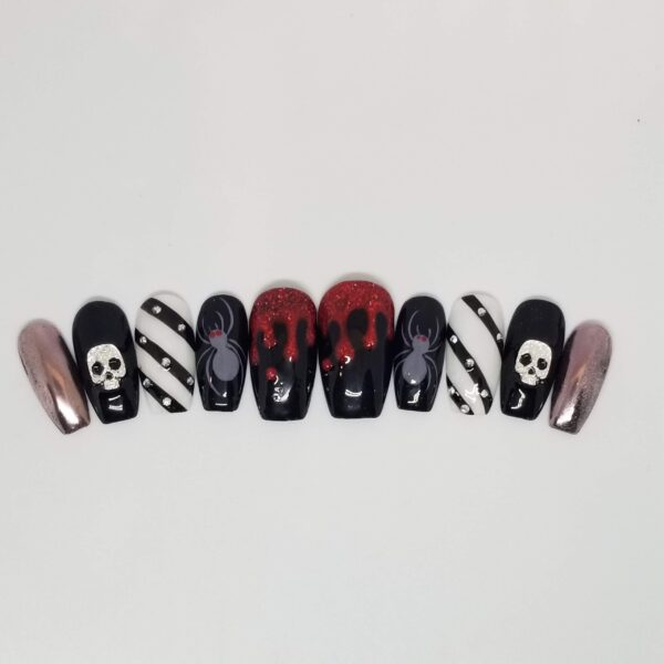 black Halloween skull nail design