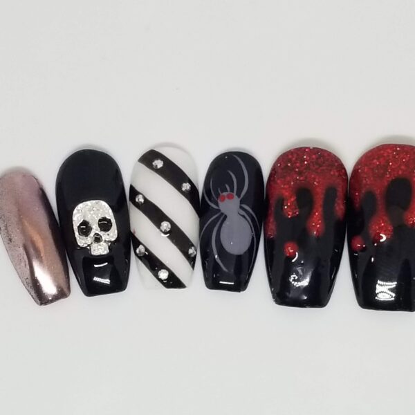 black Halloween skull nail design